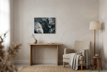 Load image into Gallery viewer, REST original oil painting hung as a statement piece in a minimalist living room with neutral linen and warm natural light